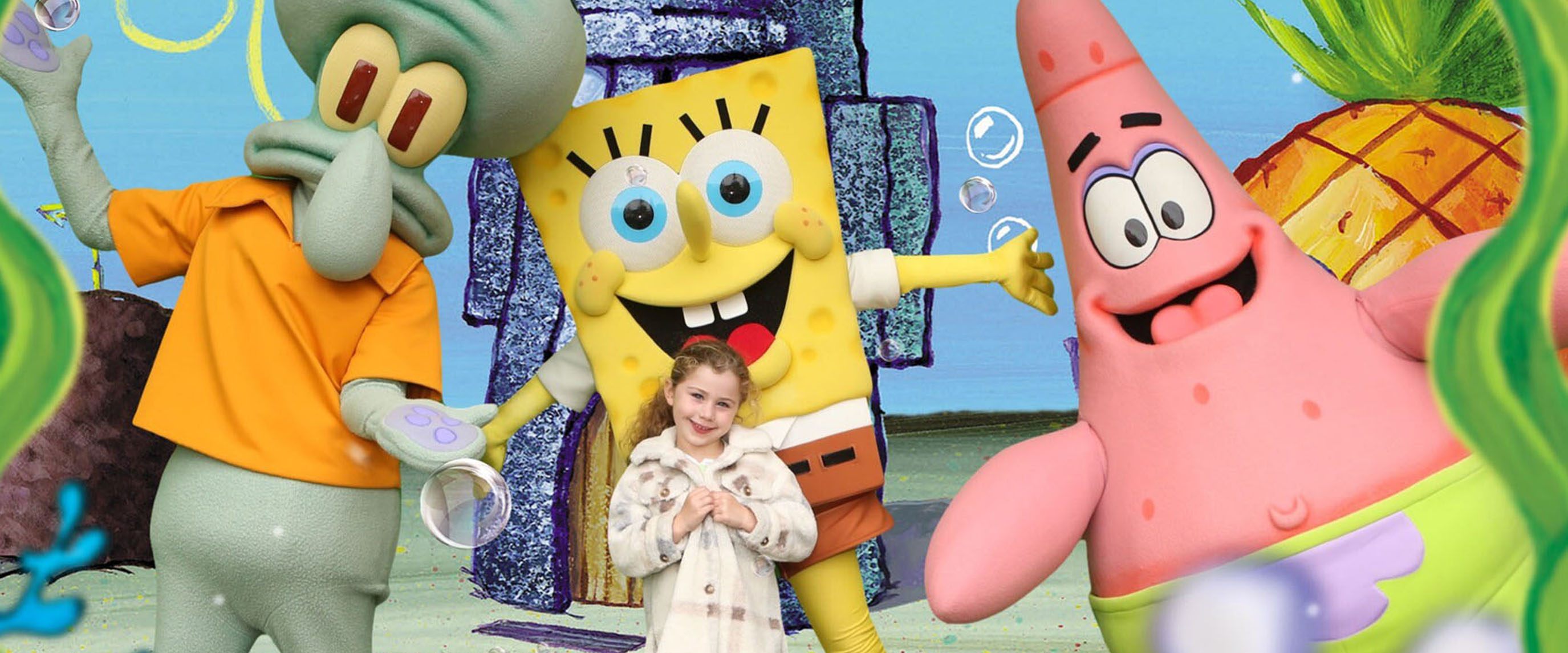 SpongeBob, Patrick and Squidward with a guest at Nickelodeon Land